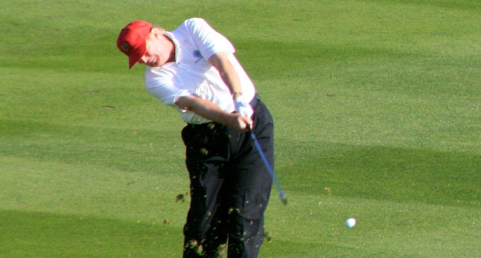 Vacationing Trump complains about China while officers are being shot in Philadelphia