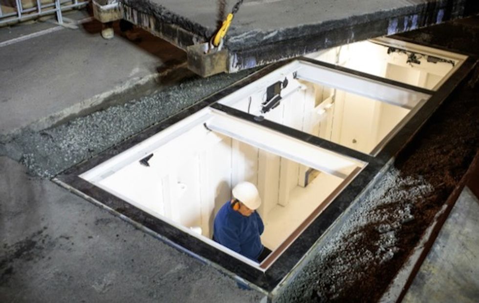 Artist buried for three days under busy Australian road