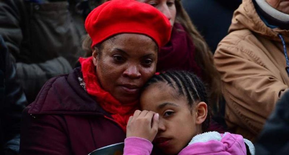 'Brussels I love you': Hundreds of residents gather for vigil after terrorist attack