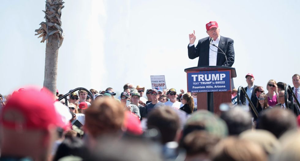 Trump-loving mom blames 'Democratic schools' after young son yells 'Take the b*tch down' at rally