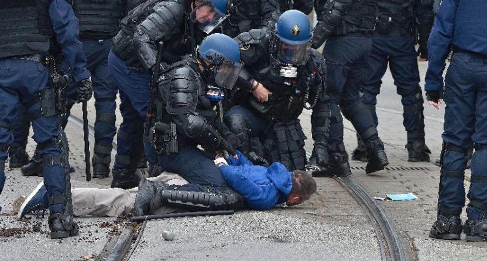 Outrage in France after video shows police beating teen protester