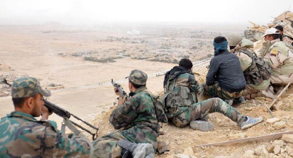 Syria troops continue to beat back Islamic State fighters after victory in Palmyra