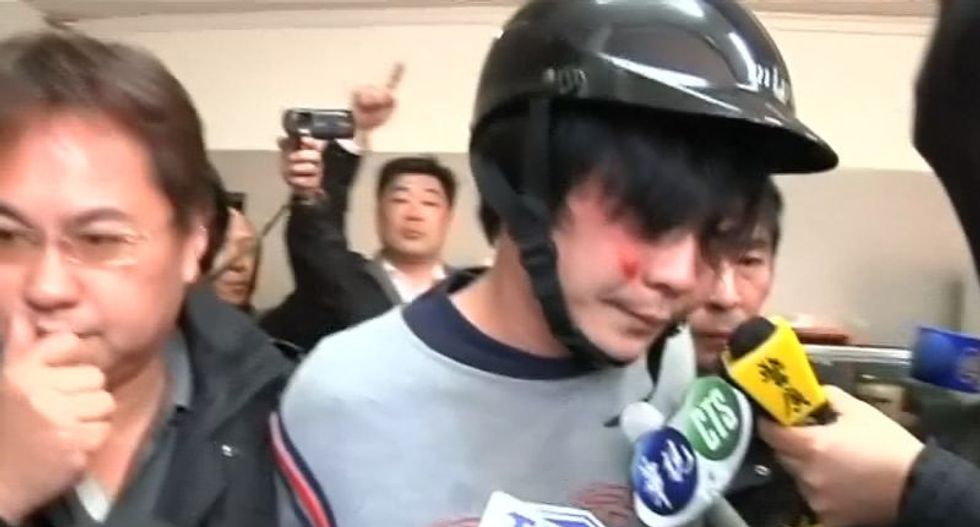 Taiwan beheading suspect beaten by angry mob