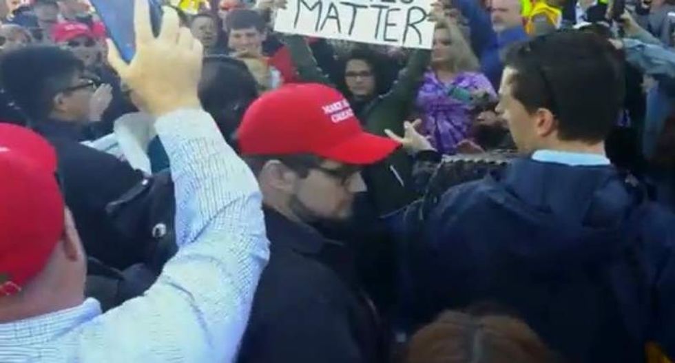 New footage reveals Trump fan who pepper-sprayed teenager in face outside rally
