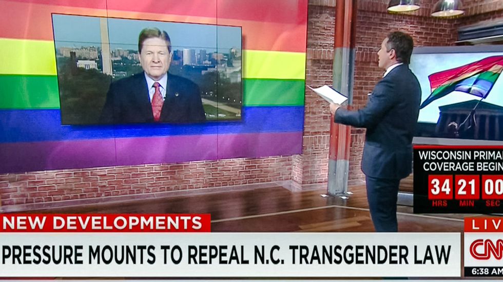 Well played: CNN trolls anti-transgender activist with massive rainbow flag backdrop