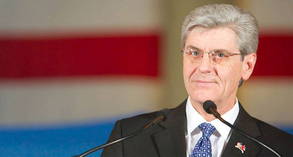 '#1 in bigotry': Twitter unleashes its wrath on Mississippi's 'dinosaur' governor over new anti-gay law