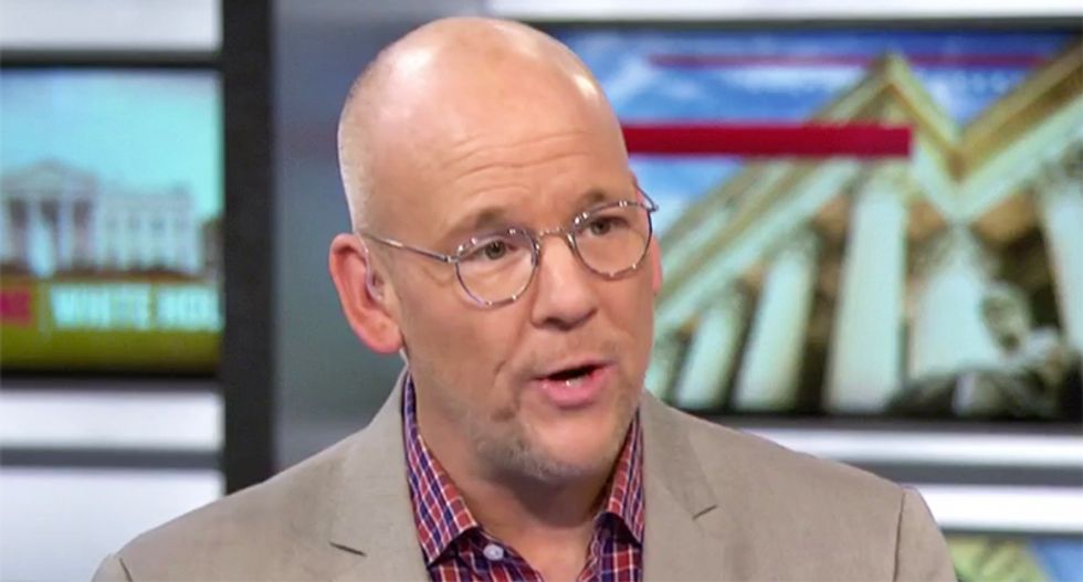 MSNBC analyst John Heilemann warns that ‘Dan Coats' days are numbered’ after advisers laughed at Trump