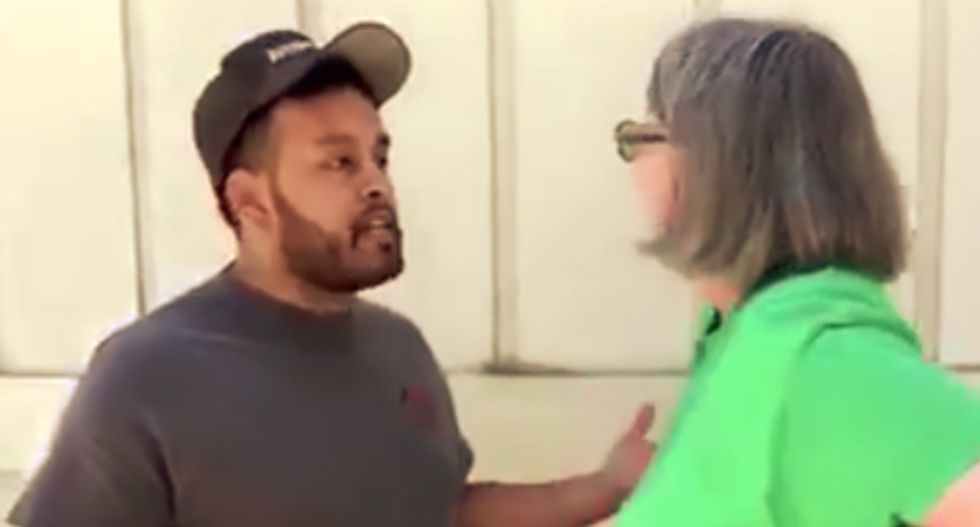 WATCH: White woman cites Trump to justify calling a Latino man a 'rapist and animal'