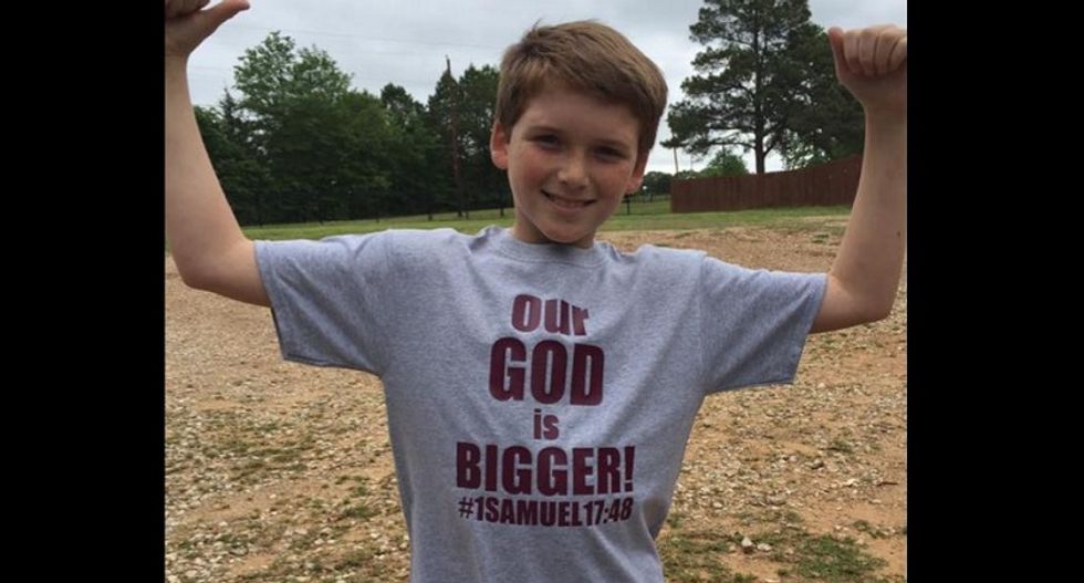 Christian parents angry that Bible verse was taken off district website dress kids in 'Our God is bigger' shirts
