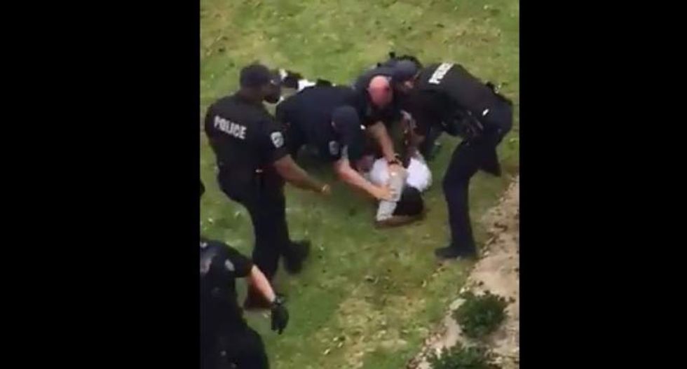 Baton Rouge cops under investigation after video catches them beating 16-year-old boy