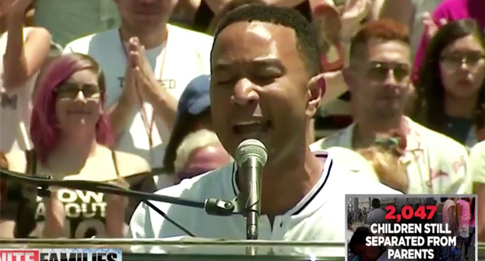 WATCH: John Legend premiers new gospel-inflected song 'Preach' at #FamiliesBelongTogether rally in LA