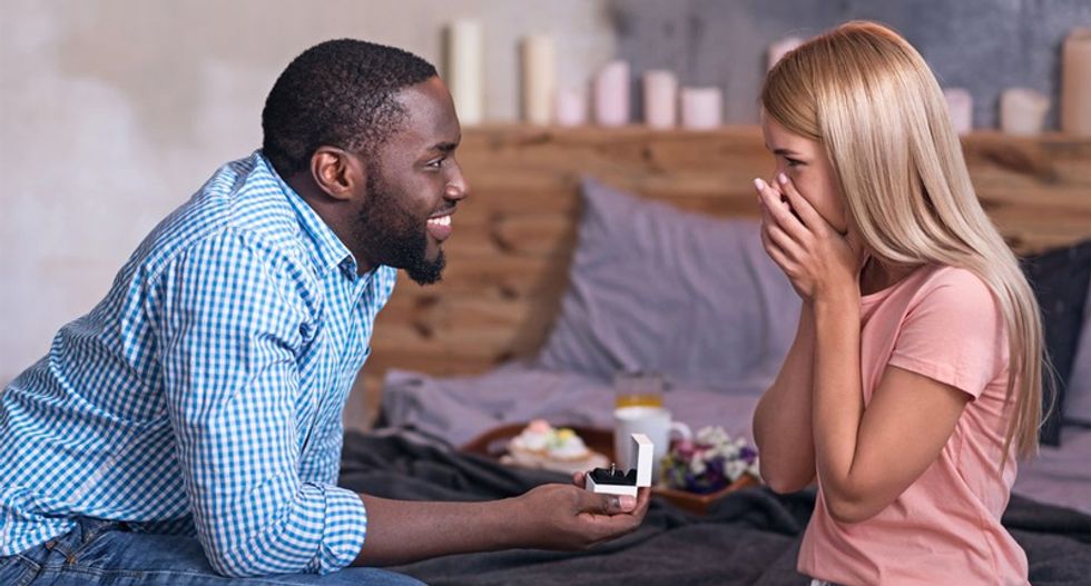 'Anti-white filth will get you shut down': Twitter racists melt down over interracial couple engagement ad