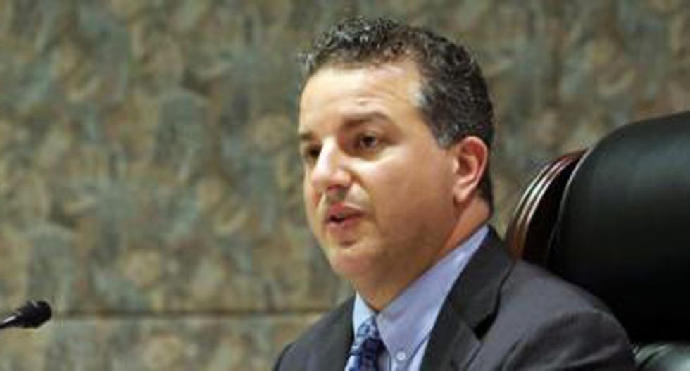White Florida state official asks black man seeking right to vote: 'How many different mothers, kids do you have?'