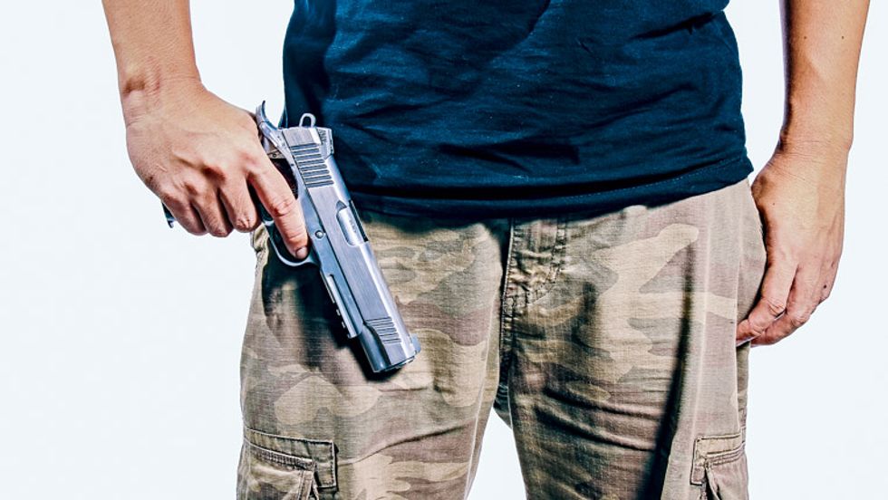 Michigan gun nut can openly carry his pistol at daughter's school despite district ban: judge