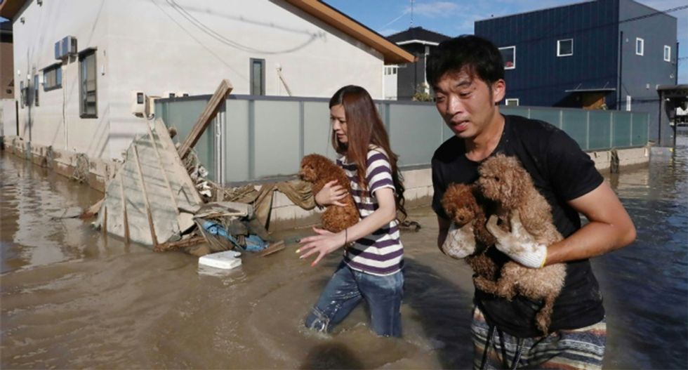 Desperate rescue efforts as Japan rain death toll hits 75