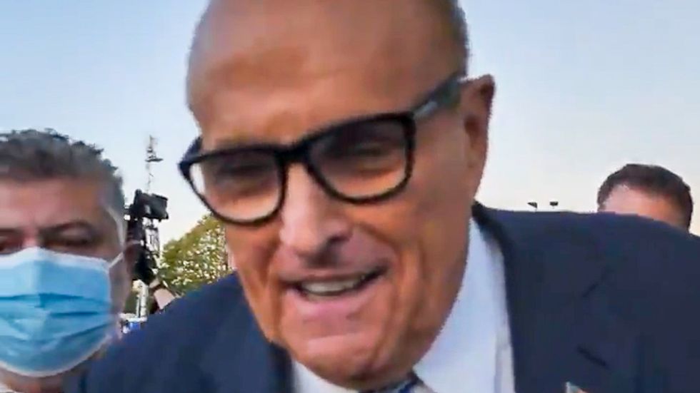 'You're a sore loser': Eric Trump and Rudy Giuliani face off with British reporter