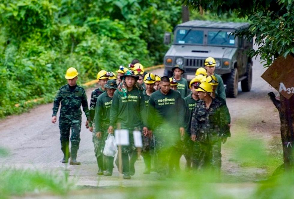 All 13 rescued from flooded Thai cave: navy SEAL unit
