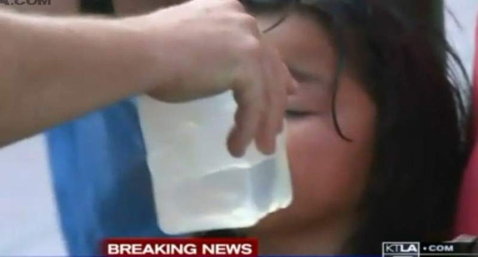 Kids hit with pepper spray amid clash over California city council's anti-Trump proposal