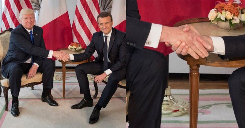 WATCH: Trump tries power handshake on French president -- and gets defeated by a white knuckle grip
