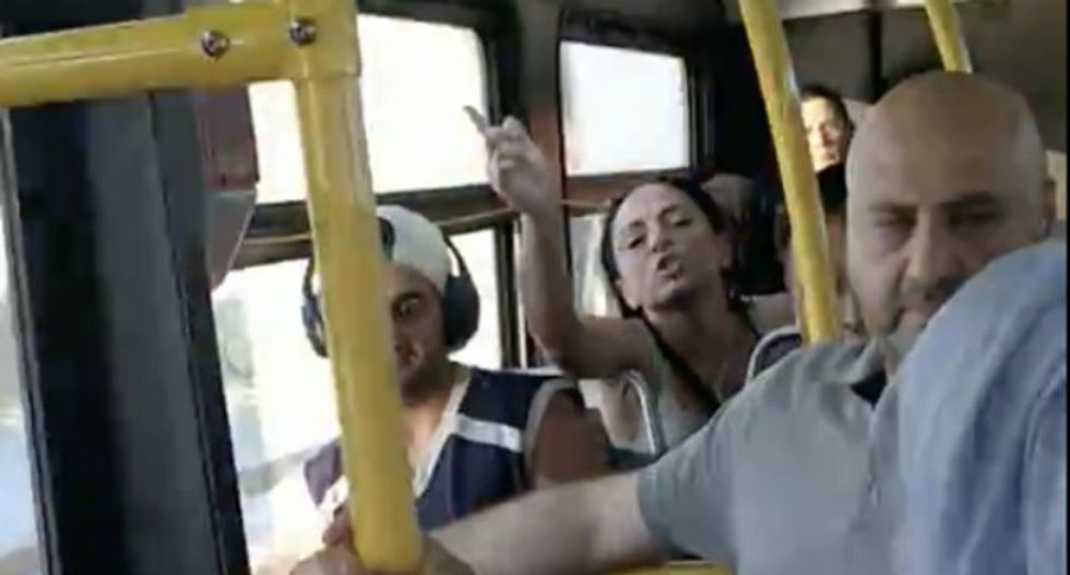 Racist NYC bus rider taunts Muslim woman in a headscarf: 'ICE is here for you'