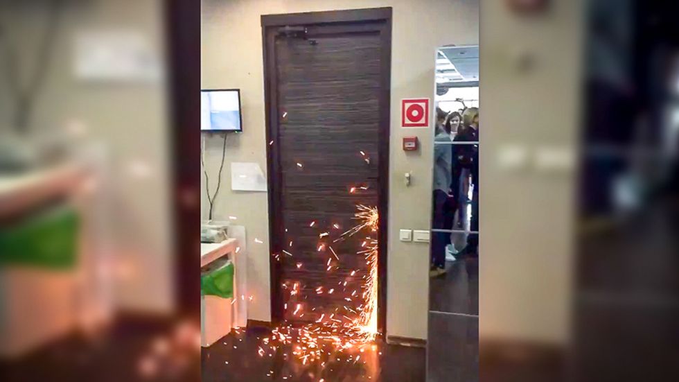 Pro-Putin forces raid Russian anti-corruption offices and detain leader moments before YouTube broadcast