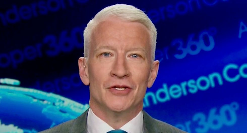 Watch CNN's Anderson Cooper hilariously rake Trump over the coals for living in a 'witch hunt' fantasy world