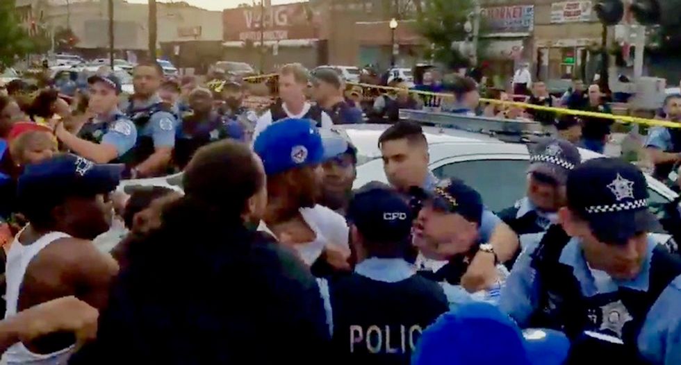 WATCH: Street protests erupt in Chicago after police officer reportedly shoots black man in back as he was fleeing