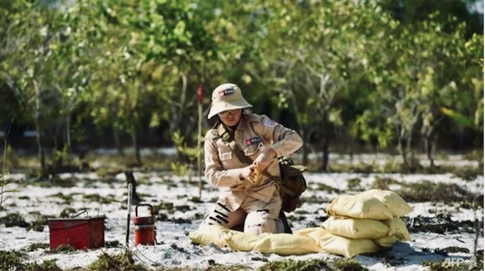 Vietnamese women strive to clear war-era mines