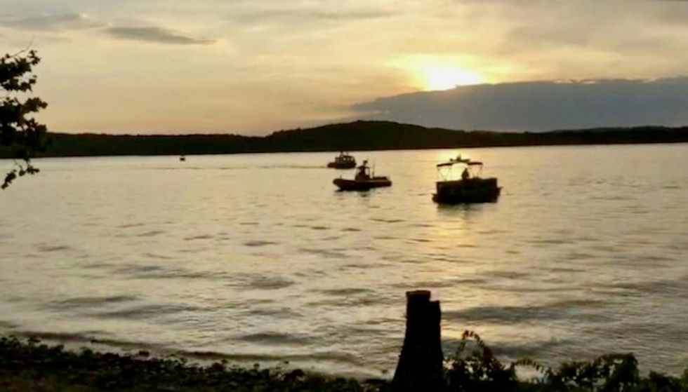 Seventeen dead after Missouri tourist boat sinks in storm