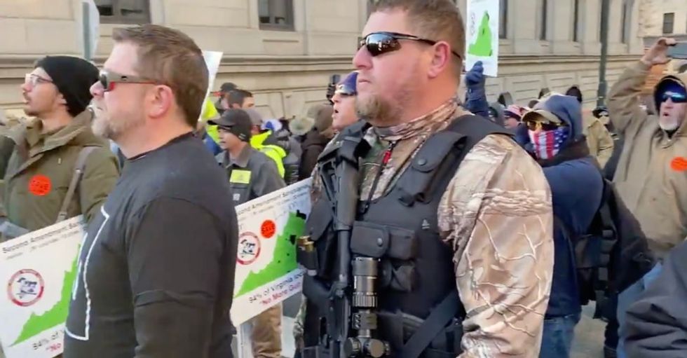 ‘Can you imagine a group of black men walking around with masks and guns?’ Virginia rally sparks questions of racism and privilege