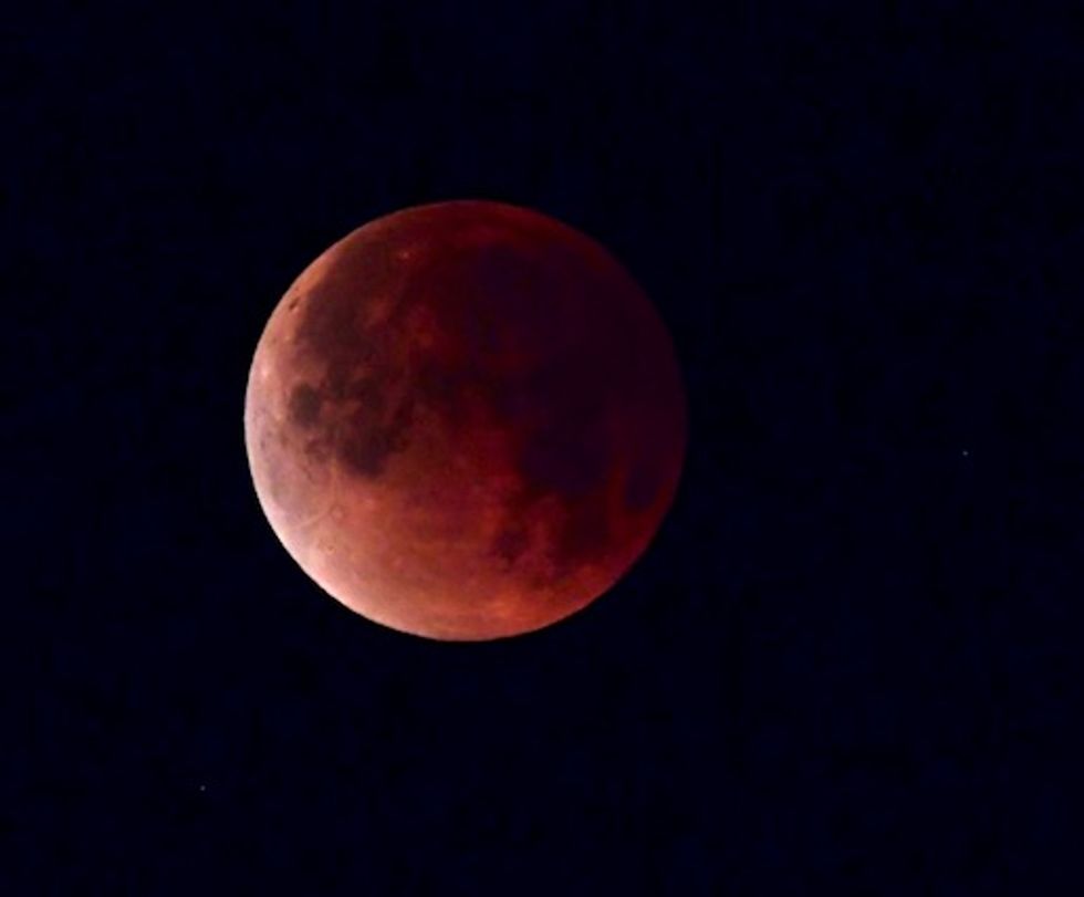 Red planet and 'blood moon' pair up to dazzle skygazers
