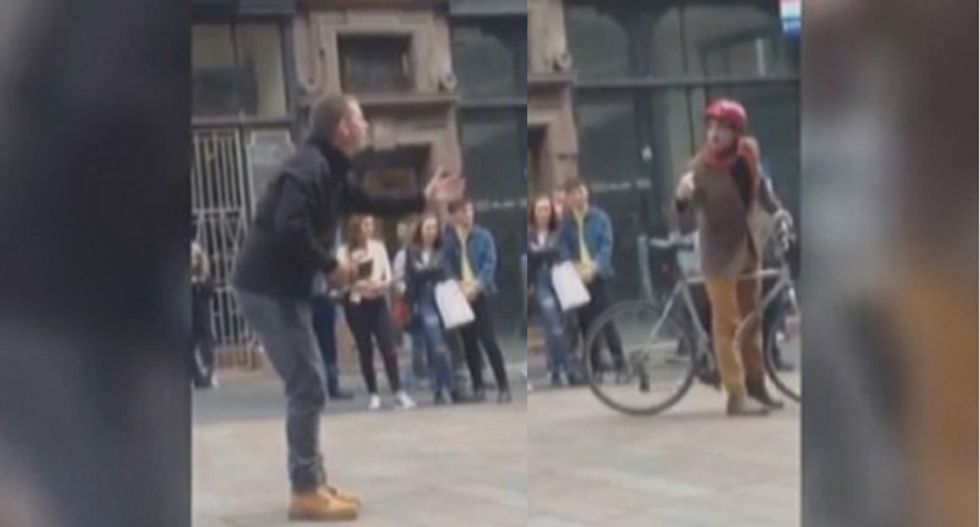 WATCH: Gay cyclist shuts down ranting anti-gay street preacher -- and the crowd goes wild