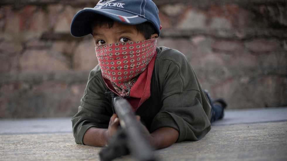 Mexican children take up arms in fight against drug gangs