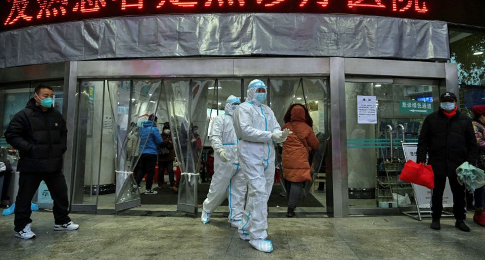 China reports 323 new cases of mysterious virus -- as death toll rises to 54