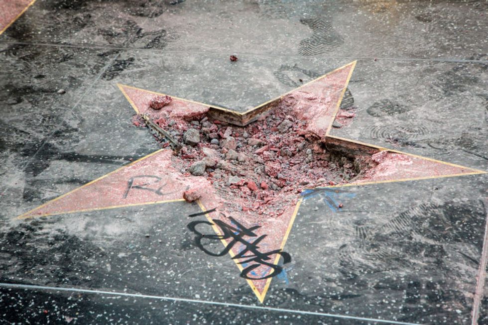 WATCH: Massive brawl breaks out between Trump supporters and protesters at defaced Walk of Fame star