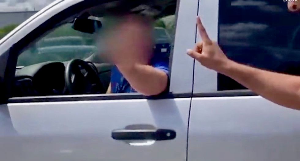 WATCH: White man drives truck into Indian couple before spewing ugly racist rant at Walmart