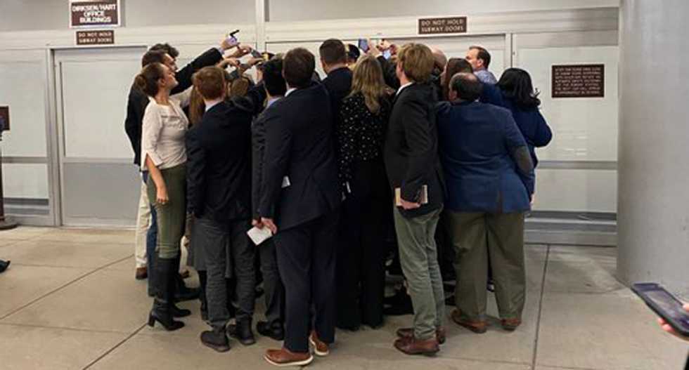 Lisa Murkowski swarmed by reporters asking if she will vote to allow impeachment trial witnesses