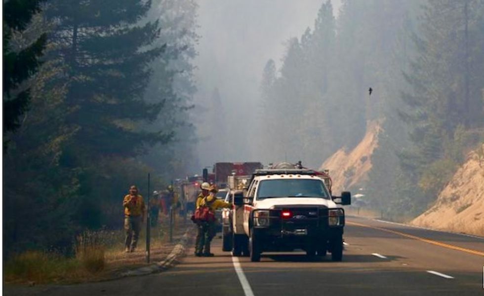 Calmer winds bring hope in battle against deadly California blaze