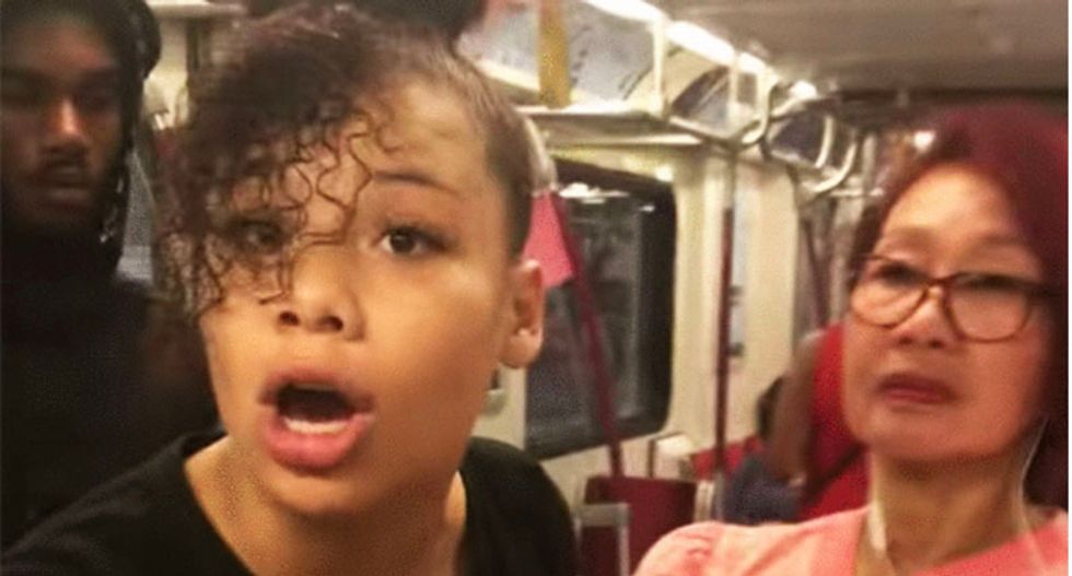 WATCH: Frantic racist chases victim through subway car to steal phone containing her ugly recorded rant