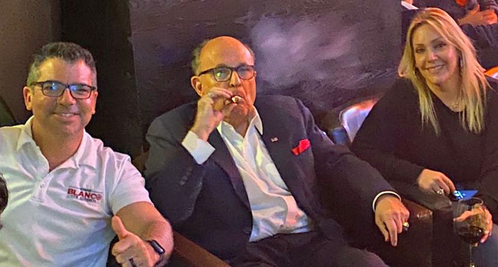 Rudy Giuliani posted celebratory pics of him sucking on cigars after GOP blocked impeachment witnesses