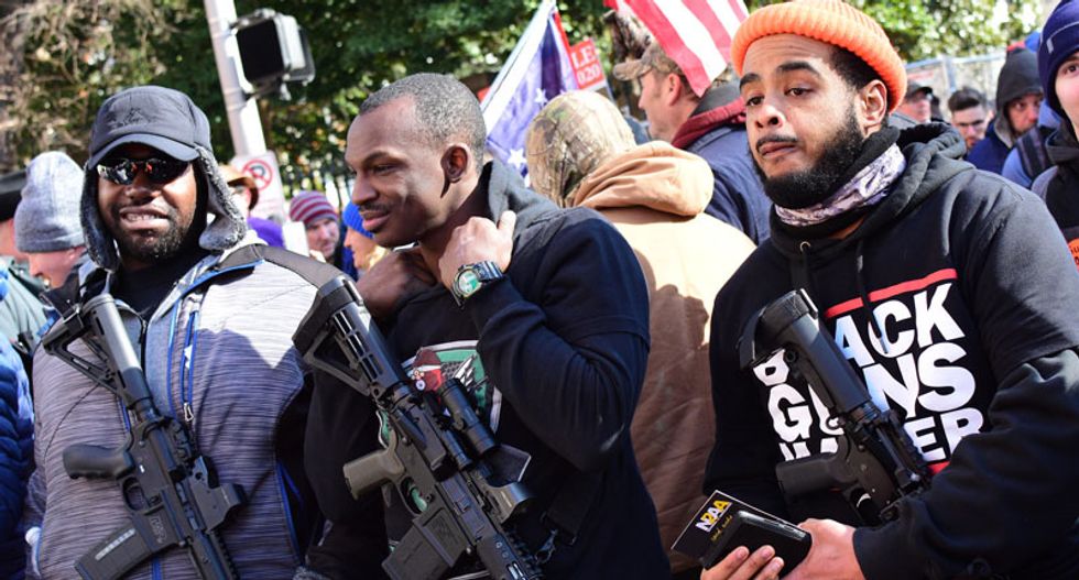Militia groups spurn alt-right 'trash' at Virginia gun rally while establishing a dialogue with militant leftists