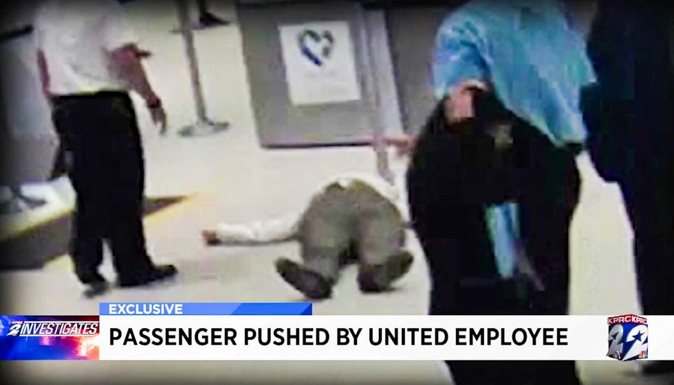 WATCH: United employee caught on camera pushing 71-year-old passenger to the ground