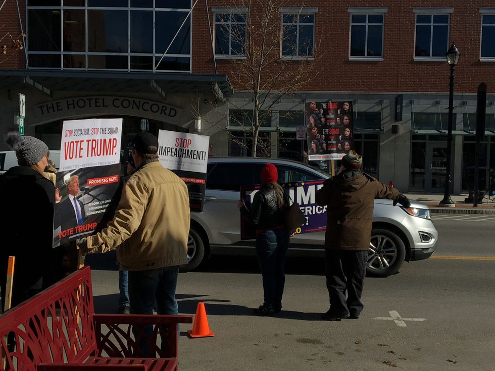 Pro-Trump Super PAC and 7 protesters bash Romney and Biden -- and try to 'stop the squad' -- at New Hampshire 2020 town hall