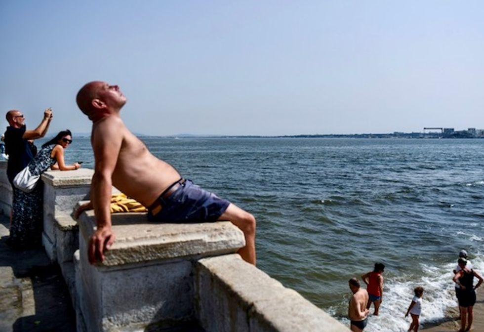 Melted asphalt, shoes for dogs: Europe wilts in heat