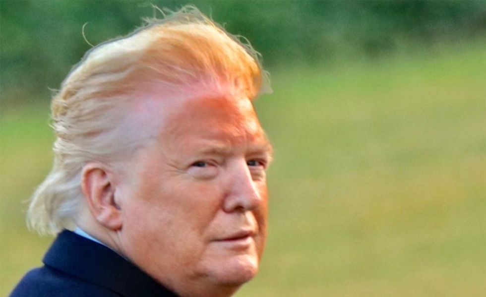 Trump retweets unflattering #orangeface picture of himself -- and then compliments his own hair