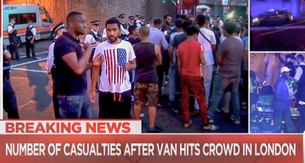 They hate us for our freedoms? Muslim mourner at scene of London attack wears American flag t-shirt