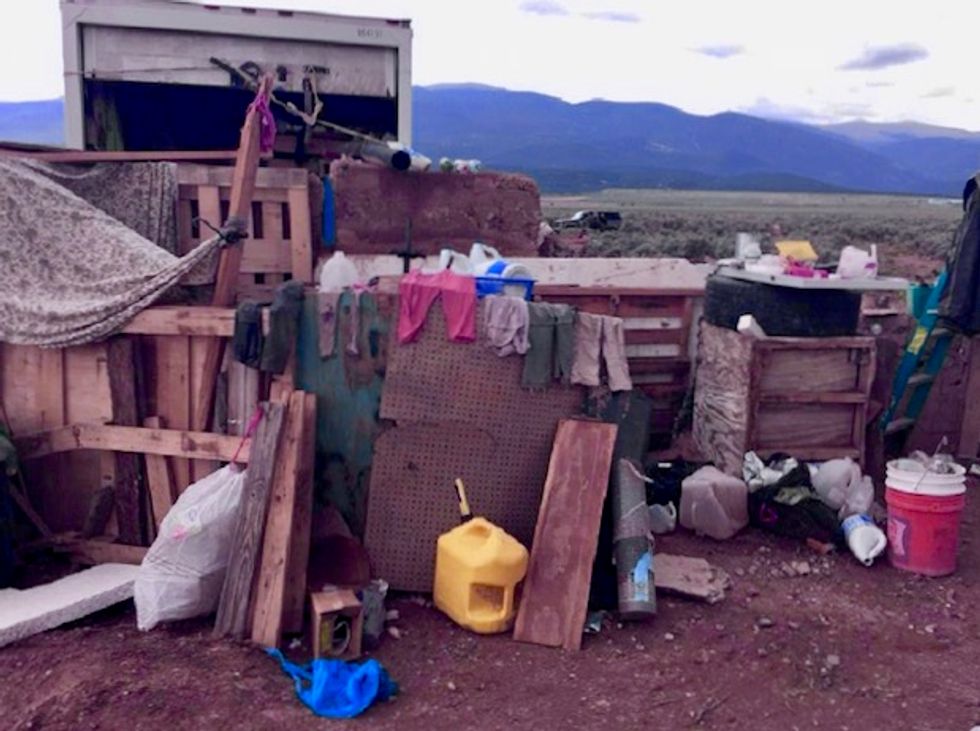 US police find body of boy at raided camp