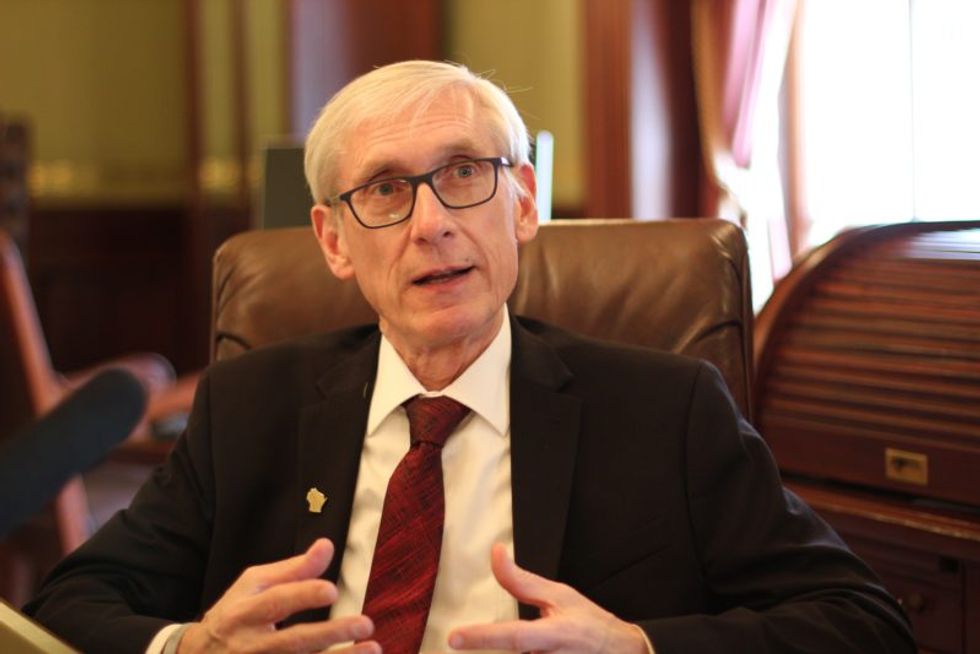 Wisconsin governor tries to force GOP to delay election as pandemic rages