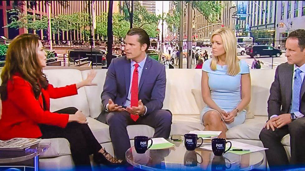 WATCH: Former Telemundo president stands up to Fox hosts on live TV for using anti-immigrant slur