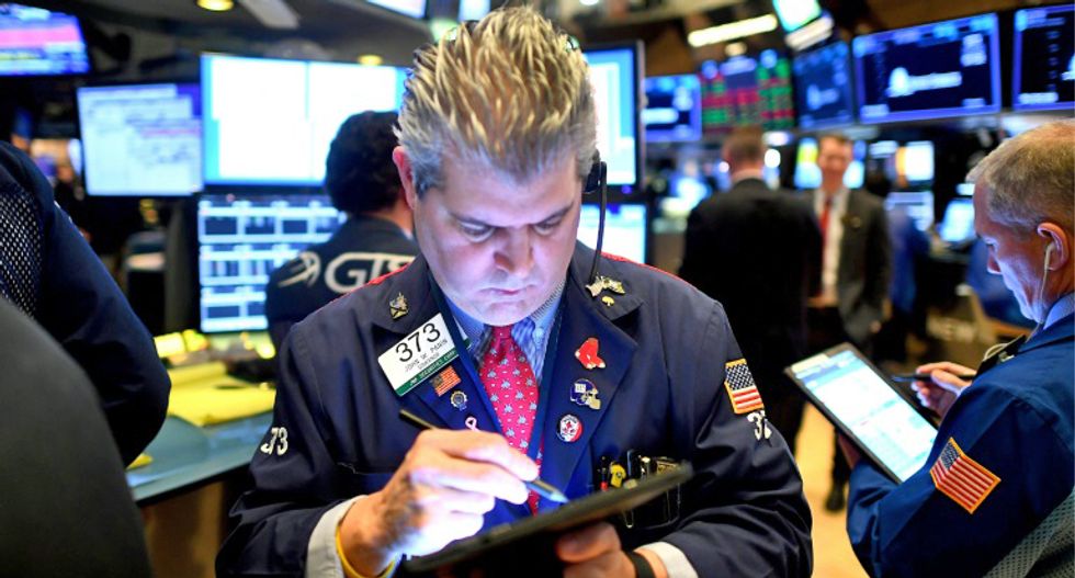 Coronavirus cases top 100,000 worldwide as markets collapse